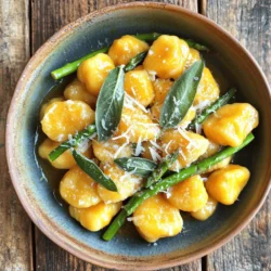 - 1 medium butternut squash (about 2 cups when mashed) - 1 cup ricotta cheese - 1 ½ cups all-purpose flour, plus more for dusting - 1 egg, beaten - ½ teaspoon nutmeg - Salt and pepper to taste The heart of this cozy dish is the butternut squash. It gives the gnocchi a sweet, nutty flavor. I often choose a medium-sized squash for the right amount. After roasting, it becomes soft and easy to mash. Ricotta cheese adds creaminess and richness to the dough. It helps keep the gnocchi light. All-purpose flour binds everything together. But be careful not to add too much. You want soft gnocchi, not dense lumps. The beaten egg acts as a binder. It also adds a touch of richness. Nutmeg brings warmth and depth to the flavor. Just a pinch can elevate the dish. Finally, salt and pepper enhance all these flavors, making the gnocchi shine. - Grated Parmesan cheese - Extra crispy sage leaves For serving, I love adding grated Parmesan cheese. It adds a salty, sharp kick that pairs perfectly with the sweet squash. Extra crispy sage leaves make a lovely crunchy topping. They add flavor and a beautiful touch to your plate. Feel free to mix and match the toppings based on your preference. Each adds its own flair to the dish. Enjoy the process of creating your cozy butternut squash gnocchi! - Roasting the squash: Start by preheating your oven to 400°F (200°C). Cut the butternut squash in half and scoop out the seeds. Place it cut-side down on a lined baking sheet. Roast for about 40-45 minutes until it feels soft. This brings out the sweet flavor. - Mashing the cooked flesh: Once the squash cools a bit, scoop out the flesh into a bowl. Use a fork or potato masher to make it smooth. This will be the base of your gnocchi. - Mixing ingredients together: In a mixing bowl, combine the mashed squash, ricotta cheese, and a beaten egg. Add nutmeg and a pinch of salt and pepper. Mix until it is smooth and creamy. - Adjusting flour as needed: Gradually add 1 ½ cups of flour to the mix. Stir until the dough starts to come together. If it feels too wet, add a little more flour. Aim for a soft dough that’s not sticky. - Dividing and rolling the dough: Lightly flour a clean surface. Divide the dough into four equal parts. Roll each part into a long rope that is about 1 inch thick. - Creating gnocchi shapes: Cut each rope into 1-inch pieces. Take a fork and gently press each piece to create ridges. These ridges will help hold the sauce later. - Boiling method and timing: Bring a large pot of salted water to a boil. Carefully add your gnocchi in batches. They will float when they are ready, which takes about 2-3 minutes. - Slotted spoon technique: Use a slotted spoon to remove the gnocchi from the water. Let them rest on a plate while you prepare the sauce. This helps keep them from sticking together. To make the best gnocchi, focus on dough consistency. The dough should feel soft but not sticky. If it sticks to your fingers, add a little more flour. This keeps your gnocchi light and fluffy. Avoid sticky gnocchi by dusting your work surface with flour. This helps prevent sticking as you shape the dough. Roll the dough gently and handle it with care. Brown butter adds a rich flavor to your dish. Heat the butter over medium heat. Watch closely as it changes color. You want a golden brown, not burnt. It should smell nutty and fragrant. Add sage leaves when the butter turns golden. The sage will crisp up quickly, adding great flavor. Toss in the gnocchi right after to soak up all that goodness. This dish pairs well with a fresh salad or crusty bread. A light green salad adds a crisp contrast. For presentation, serve the gnocchi in a shallow bowl. Top with grated Parmesan and crispy sage. A sprinkle of extra nutmeg can add a nice touch. Enjoy the warmth and comfort of your meal! {{image_2}} You can change the cheese in this recipe. Instead of ricotta, try cream cheese or goat cheese. Both add a nice creaminess. You can also use cottage cheese for a lighter option. Herbs and spices can change the flavor. Instead of sage, use thyme or rosemary for a different taste. You can also add garlic powder or chili flakes for a little kick. For a different texture, pan-fry the gnocchi. Heat some butter in a skillet. Add the boiled gnocchi and cook until golden brown on all sides. This adds a nice crunch. You can also bake the gnocchi. Spread them on a baking sheet. Drizzle olive oil and bake at 400°F (200°C) until crisp. This method gives a different take on the dish. Add seasonal veggies for extra flavor. Spinach, kale, or roasted Brussels sprouts go well. They add color and nutrients too. If you want protein, consider adding chicken or shrimp. Cook them separately and mix them with the gnocchi. This makes the dish heartier and more filling. - Refrigeration tips: Let the gnocchi cool down before storing. Place them in an airtight container. Keep them in the fridge for up to three days. Make sure to layer parchment paper between gnocchi to avoid sticking. - Freezing instructions: To freeze, lay the uncooked gnocchi on a baking sheet. Freeze them for about an hour. Once frozen, transfer them to a freezer bag. They will last for up to three months. You can cook them straight from frozen; just add a minute or two to the cooking time. - Best ways to reheat gnocchi: The best way to reheat is in a skillet. Add a little butter or olive oil and heat over medium. Toss the gnocchi gently until warmed through. You can also microwave them for a minute or two, but this may lose some texture. - Avoiding mushiness: To avoid mushy gnocchi, do not overcook them when reheating. If using water, make sure it’s boiling before adding the gnocchi. Drain them quickly and do not let them sit in water. To make gnocchi, start with cooking butternut squash. Roast it until soft. Then, mash the flesh. Combine this mash with ricotta, an egg, nutmeg, salt, and pepper. Mix until smooth. Gradually add flour, stirring to form soft dough. Dust a surface with flour. Roll the dough into ropes and cut them into pieces. Use a fork to shape them. This creates ridges to hold sauce. Yes, you can use frozen butternut squash. Thaw it first and drain any excess water. Mash it until smooth, just like fresh squash. You might need less flour if it’s watery. Adjust as needed to keep the dough soft and not sticky. Butternut squash gnocchi goes well with many sauces. Brown butter sage is a classic choice. It's rich and nutty. You can also try creamy Alfredo or a light tomato sauce. For a fresh taste, a sage pesto works great. Experiment with different flavors to find your favorite! In this article, we explored how to make butternut squash gnocchi from scratch. You learned about key ingredients, step-by-step instructions, and helpful tips for perfecting your dish. Don't forget the fun variations and storage tips to keep leftovers fresh. Gnocchi can be a simple yet versatile dish. As you try your hand at making it, remember to enjoy the process and make it your own. Happy cooking!